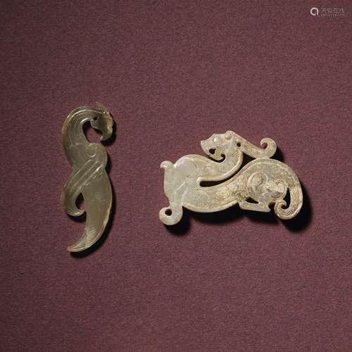 A JADE TIGER-FORM PENDANT AND A JADE PHOENIX-FORM PENDANT, X...