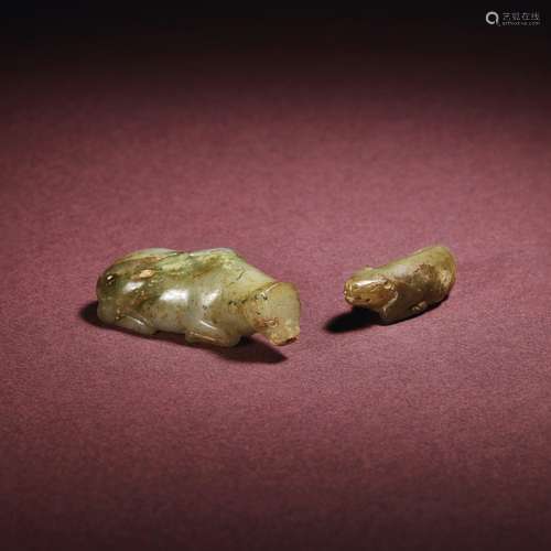 A JADE COW AND A JADE CALFWESTERN HAN DYNASTY (206 BC-AD 8)