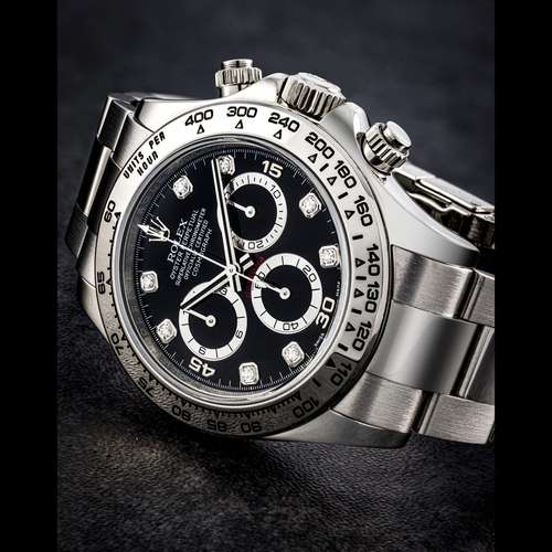 ROLEX. AN 18K WHITE GOLD AND DIAMOND-SET AUTOMATIC CHRONOGRA...