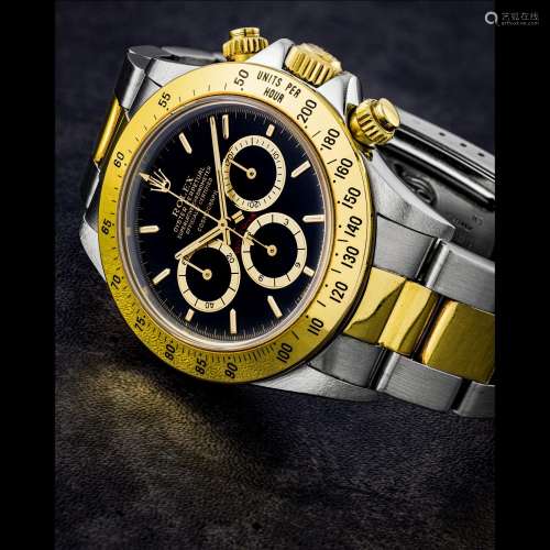 ROLEX. A RARE STAINLESS STEEL AND 18K GOLD AUTOMATIC CHRONOG...