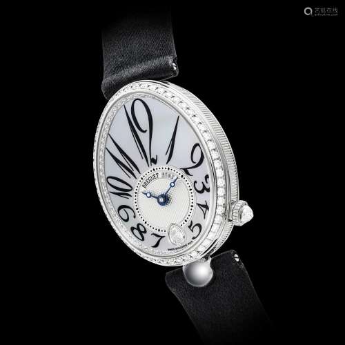 BREGUET. A LADY’S 18K WHITE GOLD AND DIAMOND-SET AUTOMATIC W...