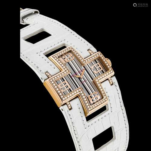 ROGER DUBUIS. A LADY’S 18K PINK GOLD AND DIAMOND-SET LIMITED...