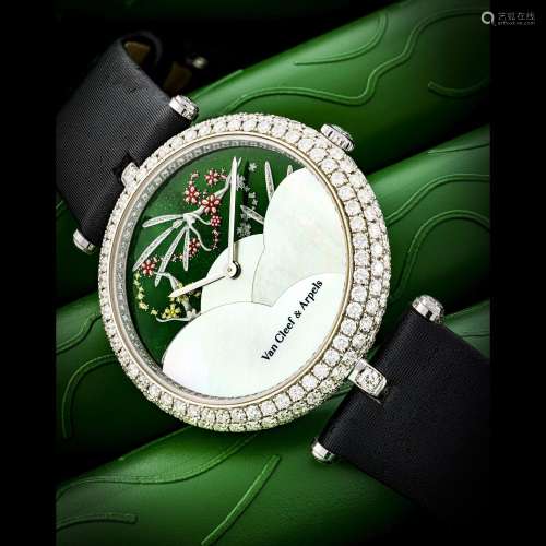 VAN CLEEF AND ARPELS. A LADY’S UNIQUE AND ELEGANT 18K WHITE ...