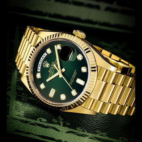 ROLEX. AN 18K GOLD AND DIAMOND-SET AUTOMATIC WRISTWATCH WITH...