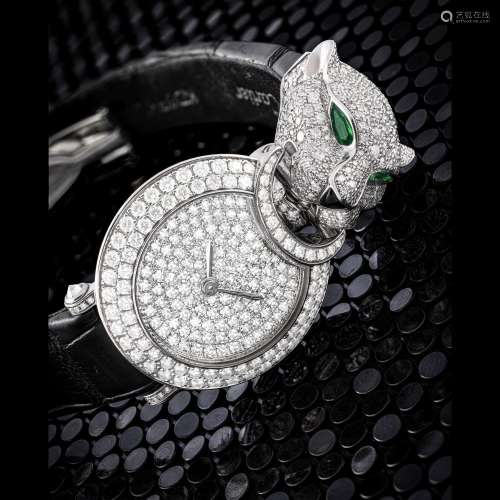 CARTIER. A LADY’S ATTRACTIVE 18K WHITE GOLD, DIAMOND, EMERAL...