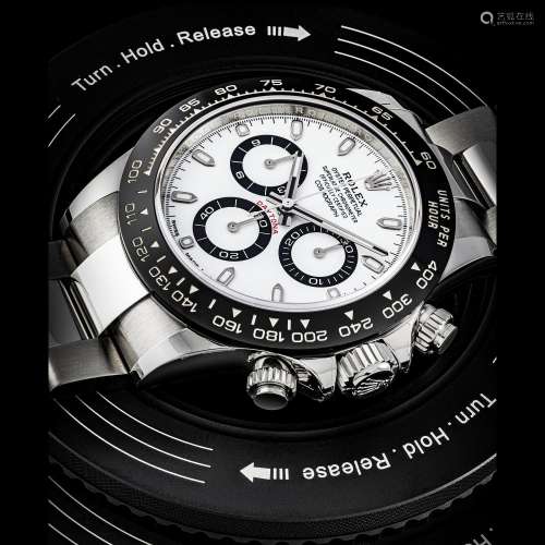 ROLEX. A STAINLESS STEEL AUTOMATIC CHRONOGRAPH WRISTWATCH WI...