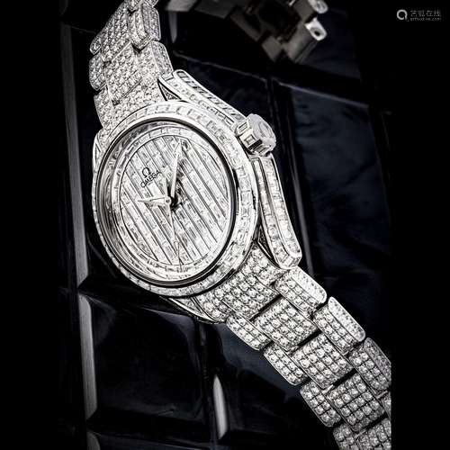 OMEGA. A LADY’S RARE AND IMPRESSIVE 18K WHITE GOLD AND DIAMO...