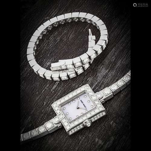 HARRY WINSTON. A LADY’S 18K WHITE GOLD AND DIAMOND-SET RECTA...