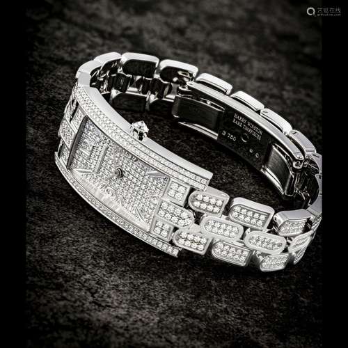 HARRY WINSTON. A LADY’S 18K WHITE GOLD AND DIAMOND-SET RECTA...