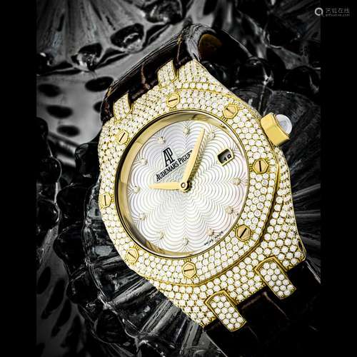 AUDEMARS PIGUET. A LADY’S 18K GOLD AND DIAMOND-SET WRISTWATC...