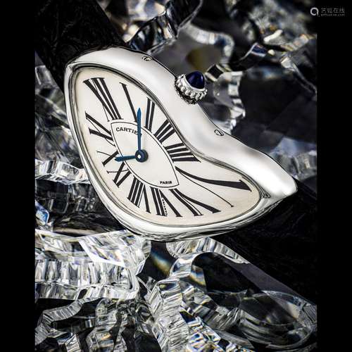 CARTIER. A VERY RARE PLATINUM ASYMMETRICAL WRISTWATCHCRASH M...