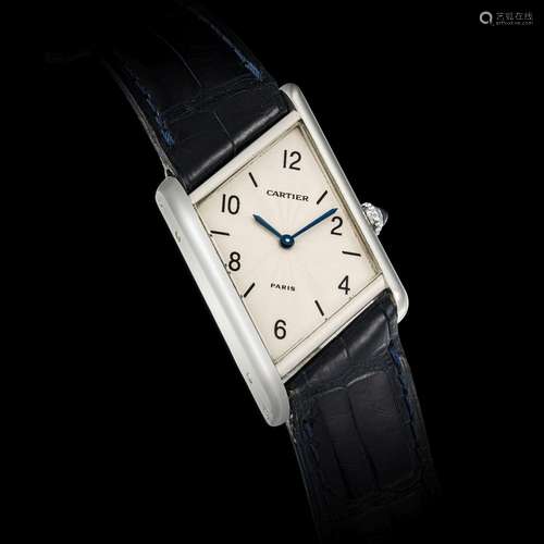 CARTIER. A RARE PLATINUM LIMITED EDITION ASYMMETRICAL WRISTW...