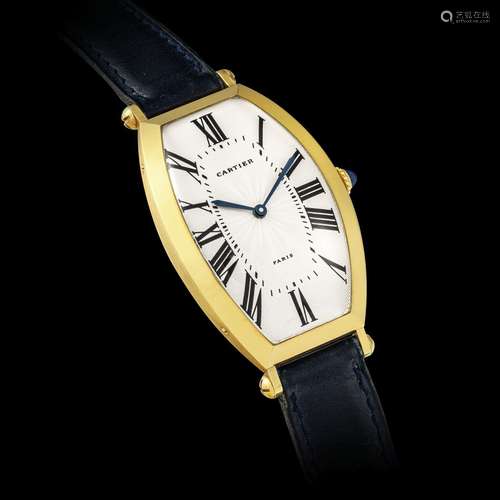 CARTIER. AN 18K GOLD TONNEAU-SHAPED WRISTWATCH2010s