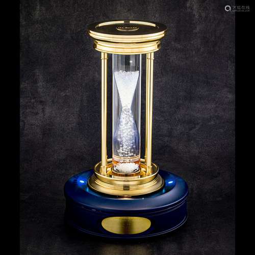 DE BEERS. A BRASS AND DIAMOND HOUR GLASS TIMER2010s