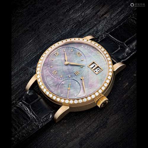 A. LANGE & SÖHNE. A LADY’S 18K PINK GOLD AND DIAMOND-SET...