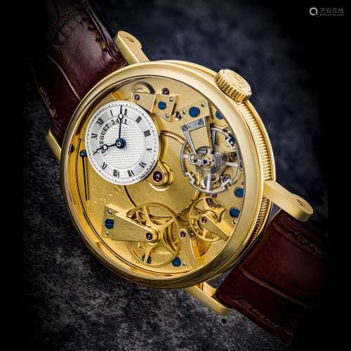 BREGUET. AN 18K GOLD SEMI-SKELETONISED WRISTWATCH WITH POWER...