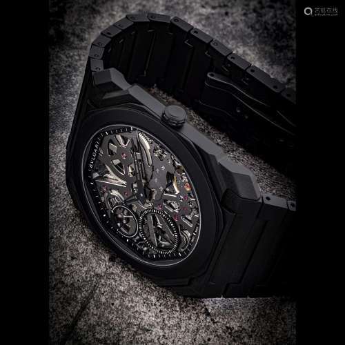 BVLGARI. AN EXTRA THIN BLACK CERAMIC SKELETONISED WRISTWATCH...