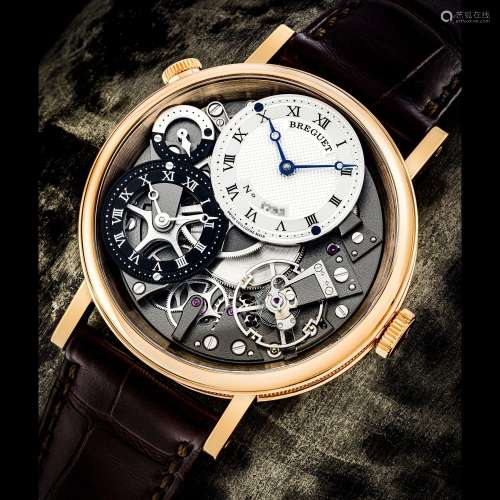 BREGUET. AN 18K PINK GOLD SEMI-SKELETONISED DUAL TIME WRISTW...