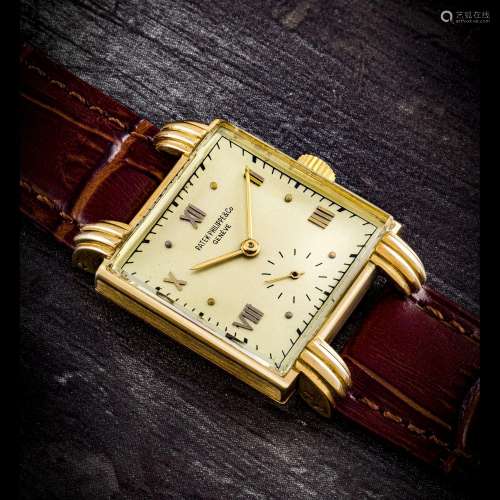 PATEK PHILIPPE. AN UNUSUAL AND RARE 18K GOLD SQUARE WRISTWAT...