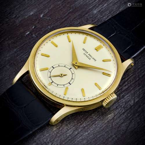 PATEK PHILIPPE. A LARGE AND ATTRACTIVE 18K GOLD WRISTWATCHRE...