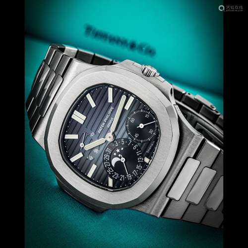 PATEK PHILIPPE. A VERY RARE STAINLESS STEEL AUTOMATIC WRISTW...