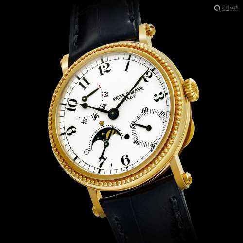 PATEK PHILIPPE. AN 18K GOLD AUTOMATIC WRISTWATCH WITH POWER ...