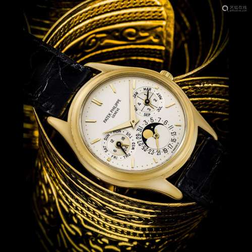 PATEK PHILIPPE. A VERY RARE 18K GOLD AUTOMATIC PERPETUAL CAL...