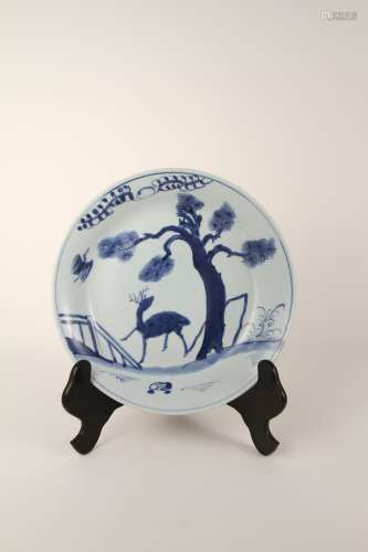 A Chinese 19th-century blue-and-white pine deer pattern disc