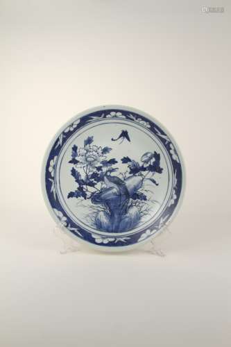 A Chinese blue-and-white flower disc of the 18th-19th centur...