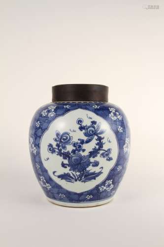 A Chinese blue-and-white windowed ice plum jar from the 19th...