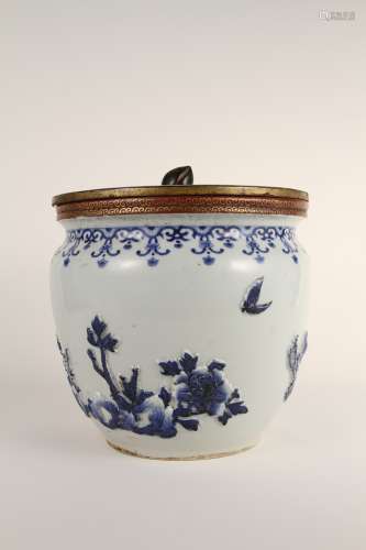 A Chinese 19th-century blue-and-white relief floral flower p...