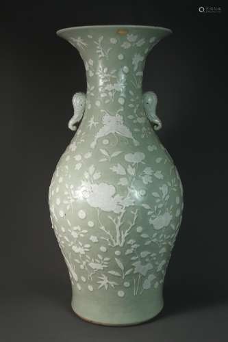 A Chinese 18th-century bean green glaze carved white flower ...