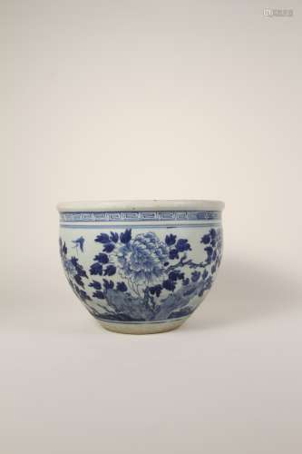 A Chinese 19th-century blue and white flower roll jar