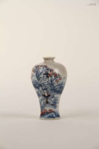 A small plum vase with red characters in blue and white glaz...