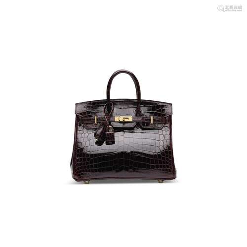 A SHINY BORDEAUX NILOTICUS CROCODILE BIRKIN 25 WITH GOLD HAR...