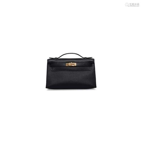 A BLACK SWIFT LEATHER KELLY POCHETTE WITH GOLD HARDWAREHERMÈ...