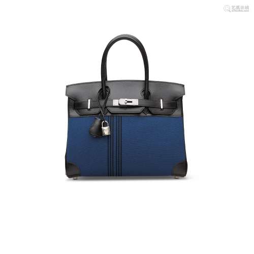 A LIMITED EDITION BLACK CALF BOX LEATHER & BLUE CANVAS P...
