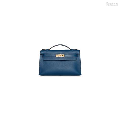 A DEEP BLUE SWIFT LEATHER KELLY POCHETTE WITH GOLD HARDWAREH...