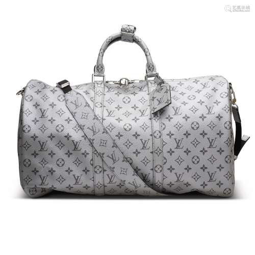 A METALLIC SILVER MONOGRAM KEEPALL BANDOULIÈRE 50 WITH SILVE...