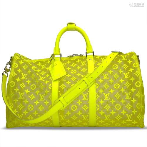 A LIMITED EDITION YELLOW EMBROIDERED MESH MONOGRAM KEEPALL B...