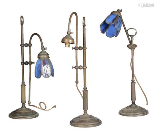 A GROUP OF THREE ADJUSTABLE BRASS READING LAMPS