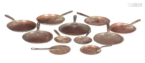 A MIXED GROUP OF ELEVEN COPPER PAN LIDS