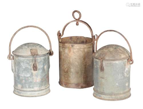 A GROUP OF THREE GALVANISED METAL DAIRY CANS