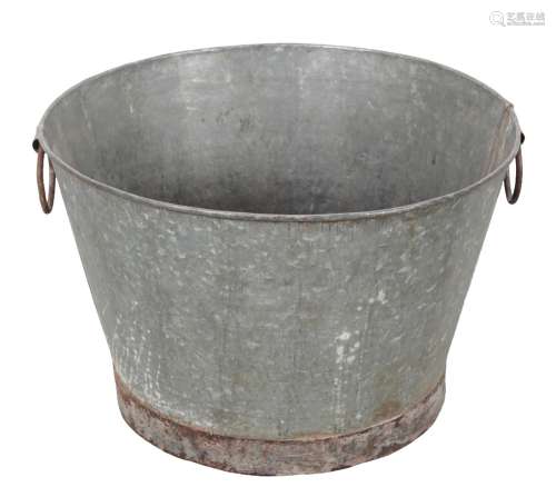 A LARGE GALVANISED METAL PLANTER