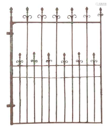 A GREEN-PAINTED WROUGHT IRON GATE