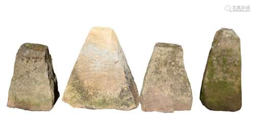 A GROUP OF FOUR STADDLE STONE BASES