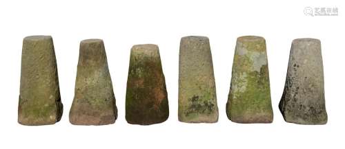 A GROUP OF SIX STADDLE STONE BASES