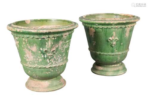 TWO GREEN-PAINTED TERRACOTTA GARDEN PLANTERS