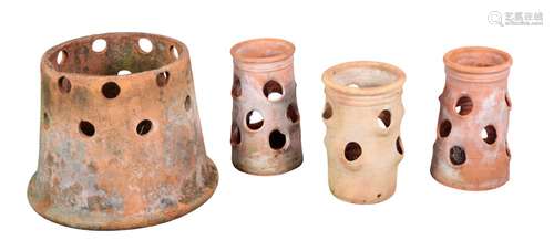 A GROUP OF FOUR TERRACOTTA PLANTERS