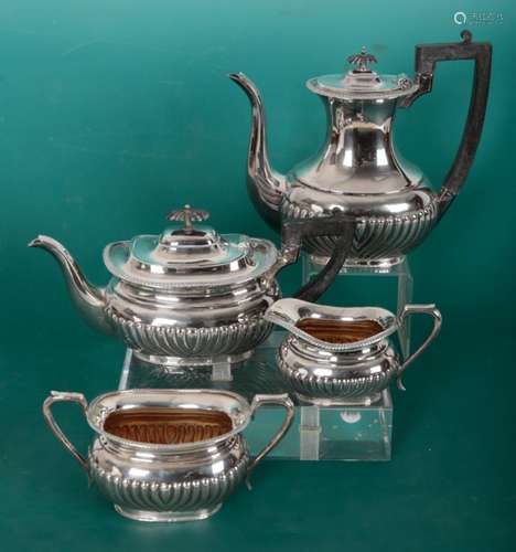 A VICTORIAN SILVER FOUR PIECE TEA AND COFFEE SERVICE BY BRAM...